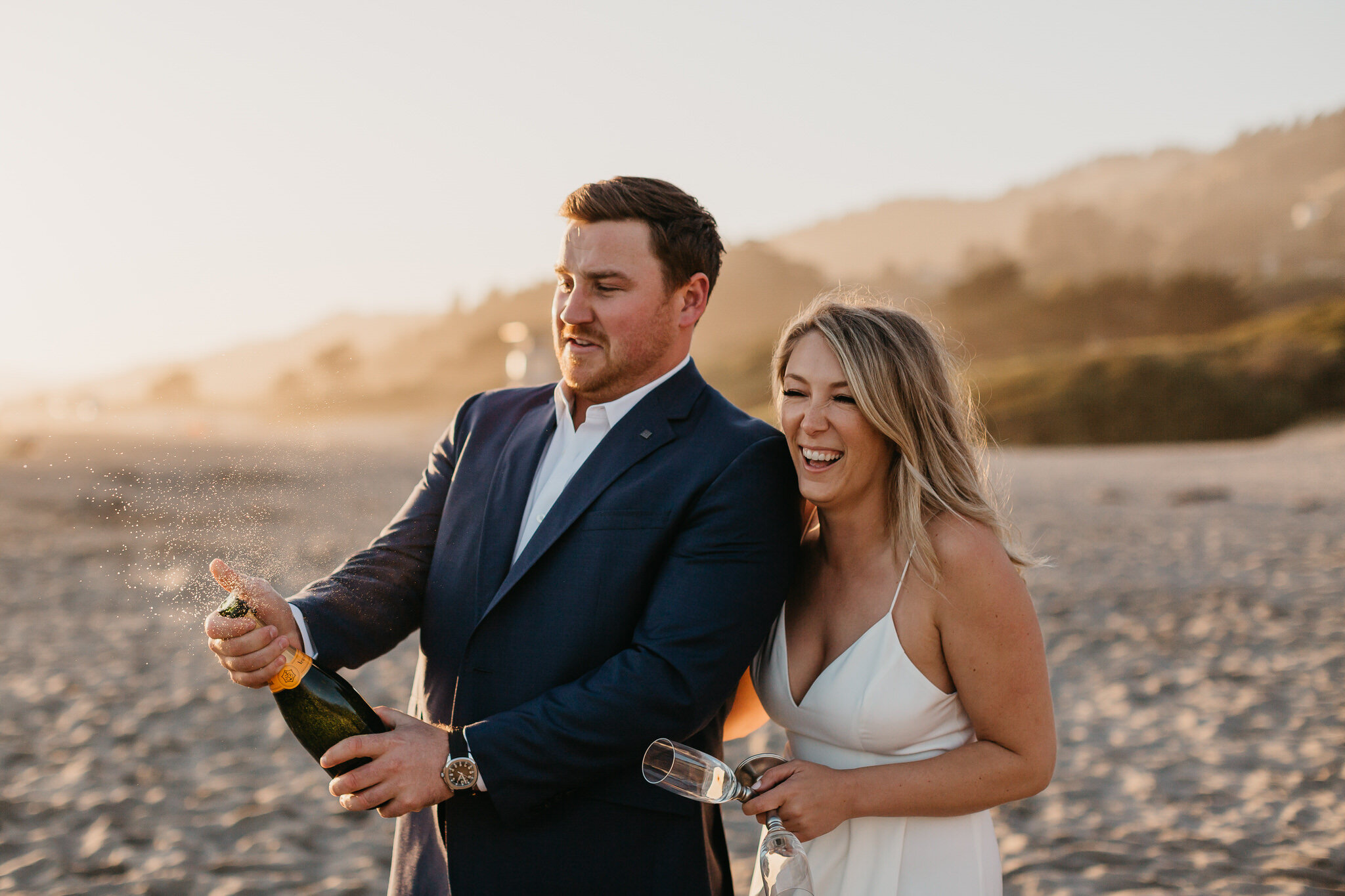 Stinson Beach engagement session with champagne, now that you're engaged, celebrate!